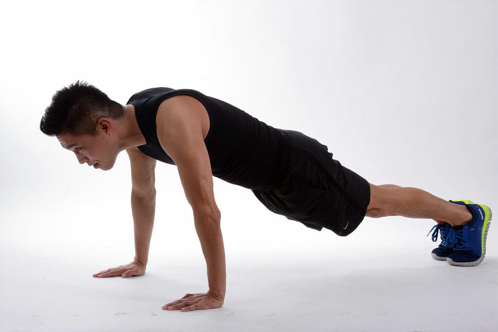 Fully Extended Press Up Position of the Burpee Crossfit Exercise