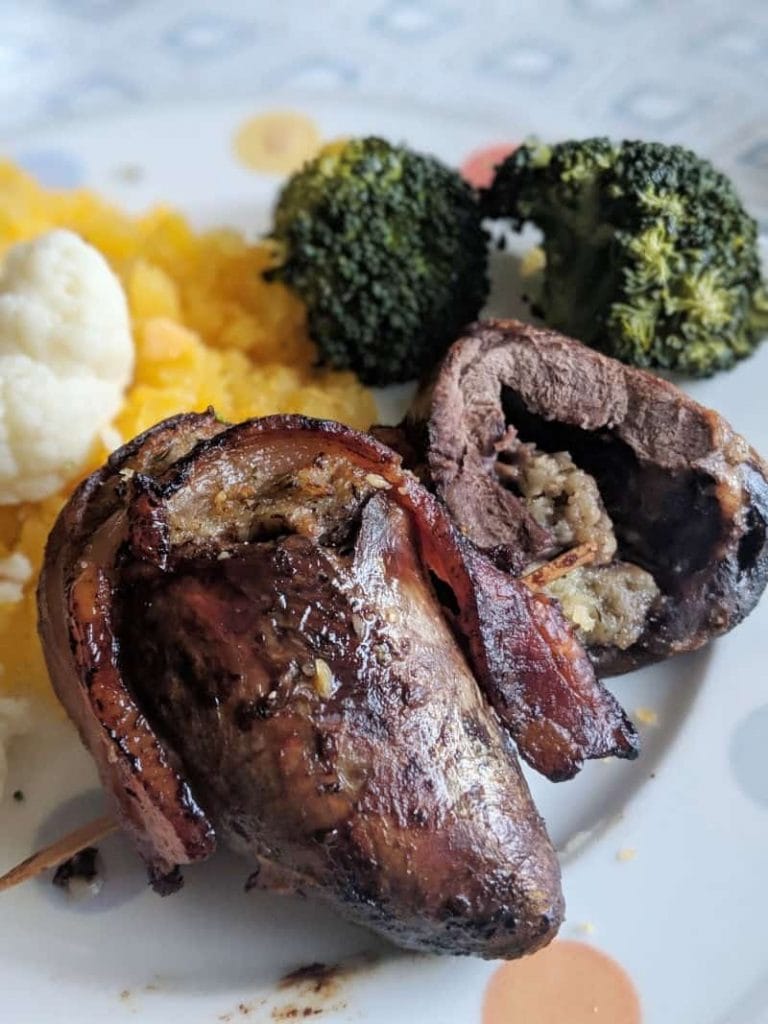 beef hearts wrapped in bacon with broccoli and turnip