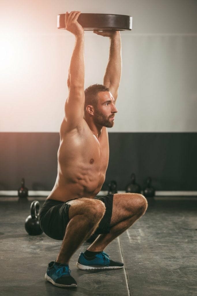 Overhead squat with plate