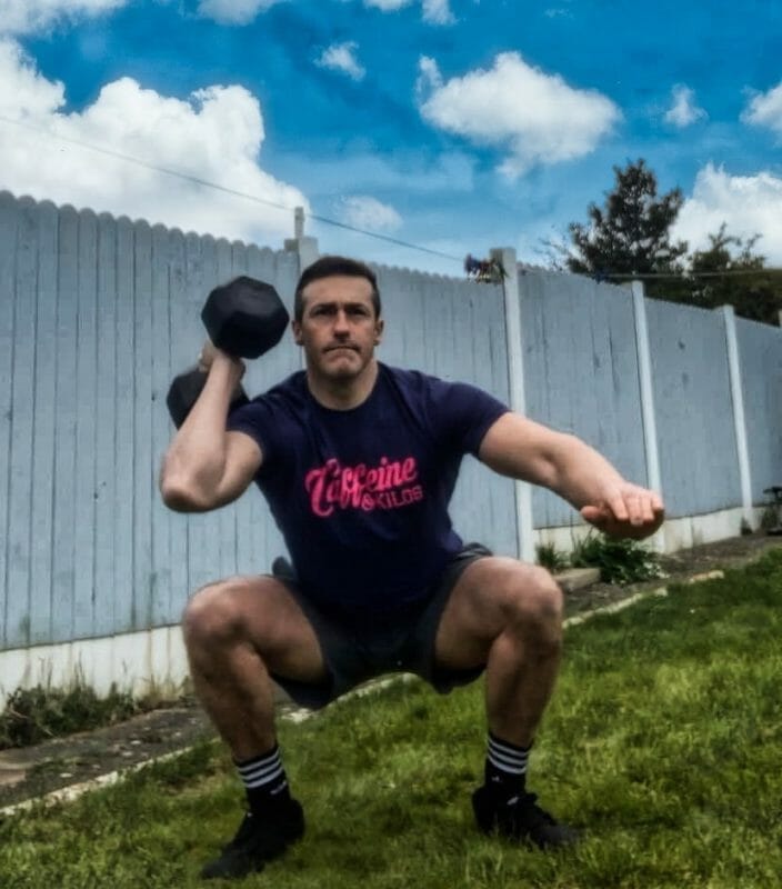 Bottom Of The Single Arm Squat Clean And Press