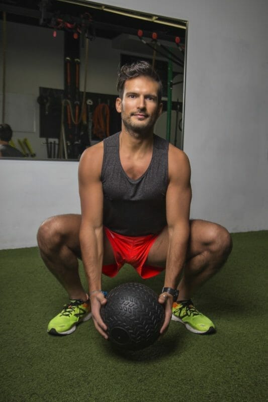 Squatting With Weighted Ball